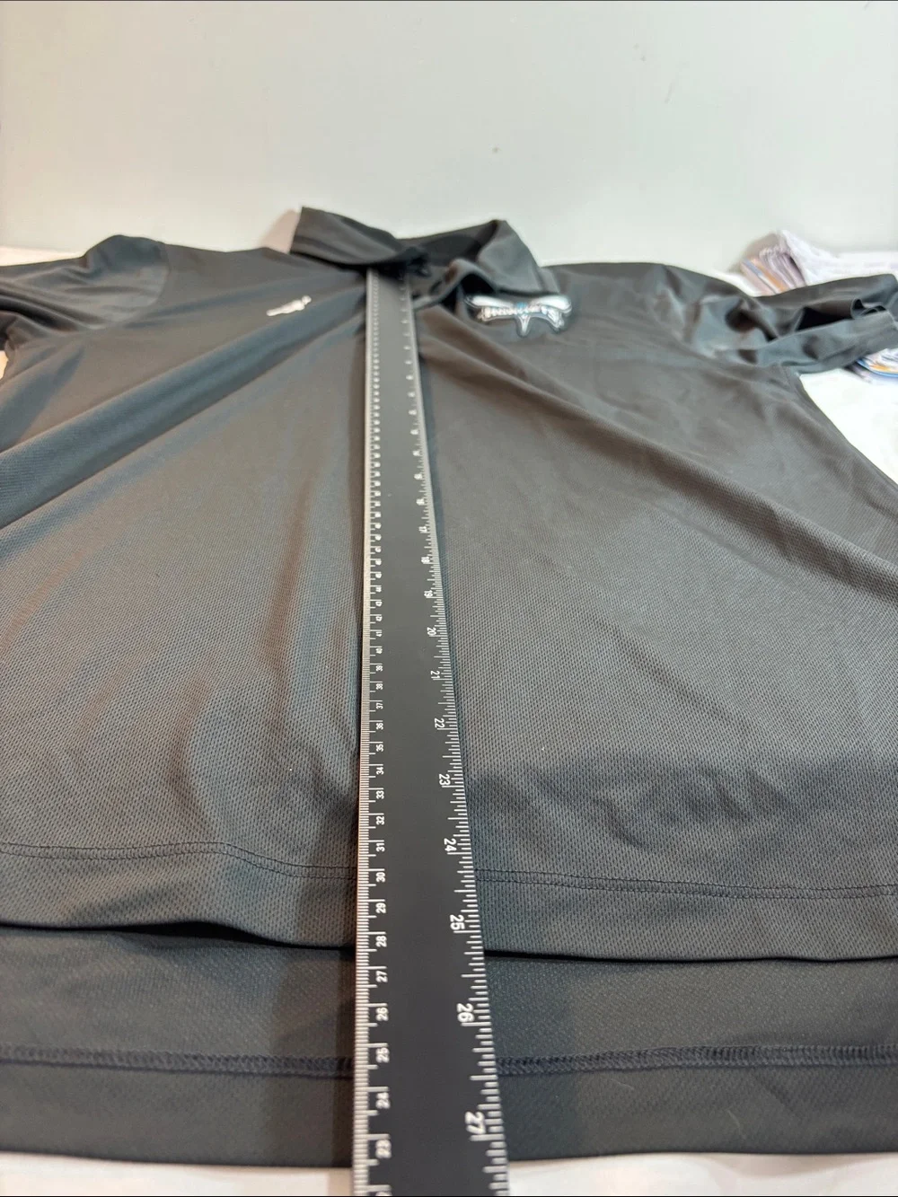 Jordan Black Charlotte Hornets Polo with White Jumpman. 0189
